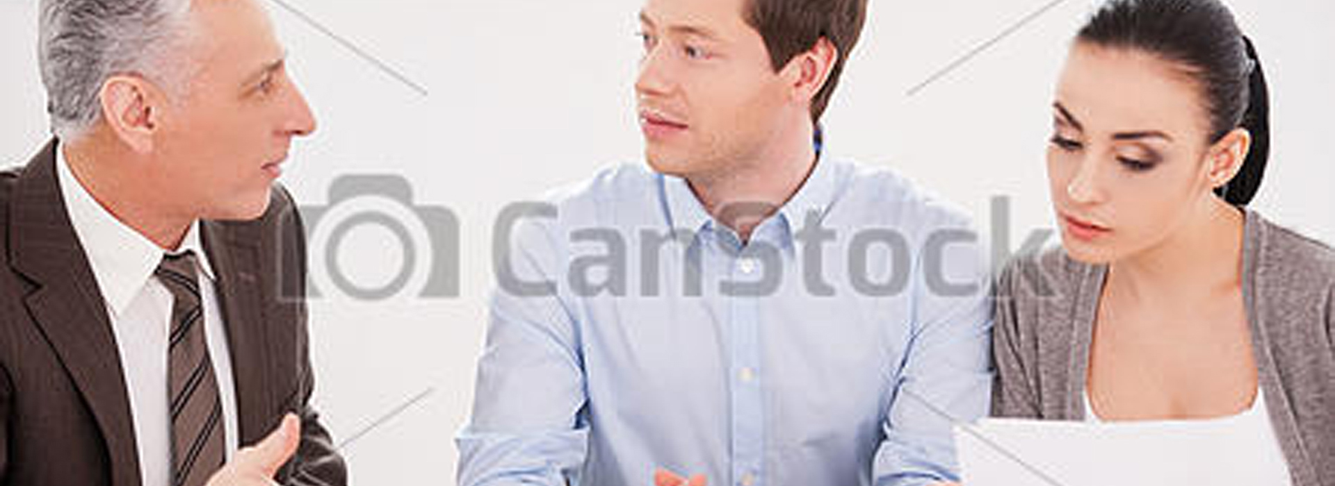 Financial consultation. Young couple sitting together at the table while senior man in formalwear telling something and gesturing